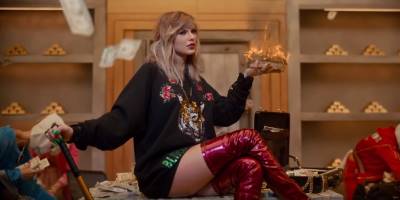 A Bank Robber Allegedly Tried Proposing to Taylor Swift by Throwing Money Over Her Fence