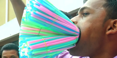 23 Y.O. Man Breaks World Record for Most Straws Stuffed in the Mouth