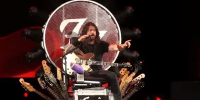 Dave Grohl And His Broken Leg Are Back On Tour, Thanks To A Rock And Roll Throne
