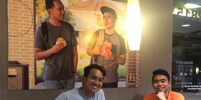 Some Friends Hung a Fake Poster of Themselves in McDonald's and No One Noticed For Weeks