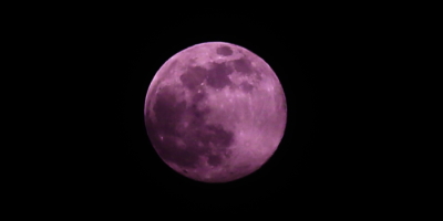 The Super Pink Moon Is the Excuse You Needed to Step Outside Tonight