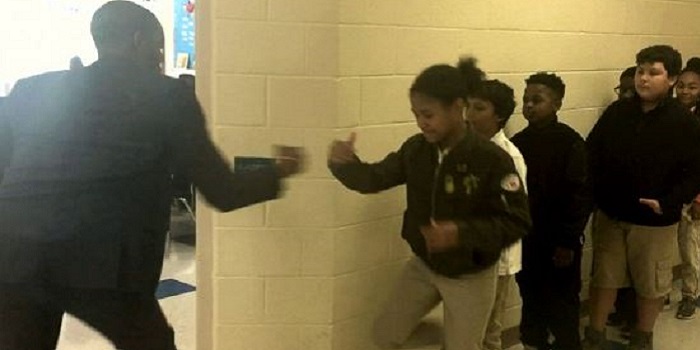 Best Teacher in the World Has a Unique Handshake With Each Student
