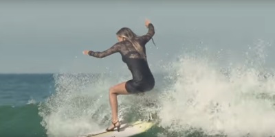 Watch A French Surfer Dominate The Swell In High Heels