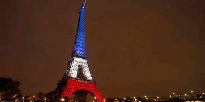 The Lights Go On At The Eiffel Tower, Beaming Blue, White And Red