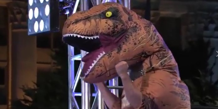 Watch A Tyrannosaurus Rex Defy Extinction To Dominate The "American Ninja Warrior" Course